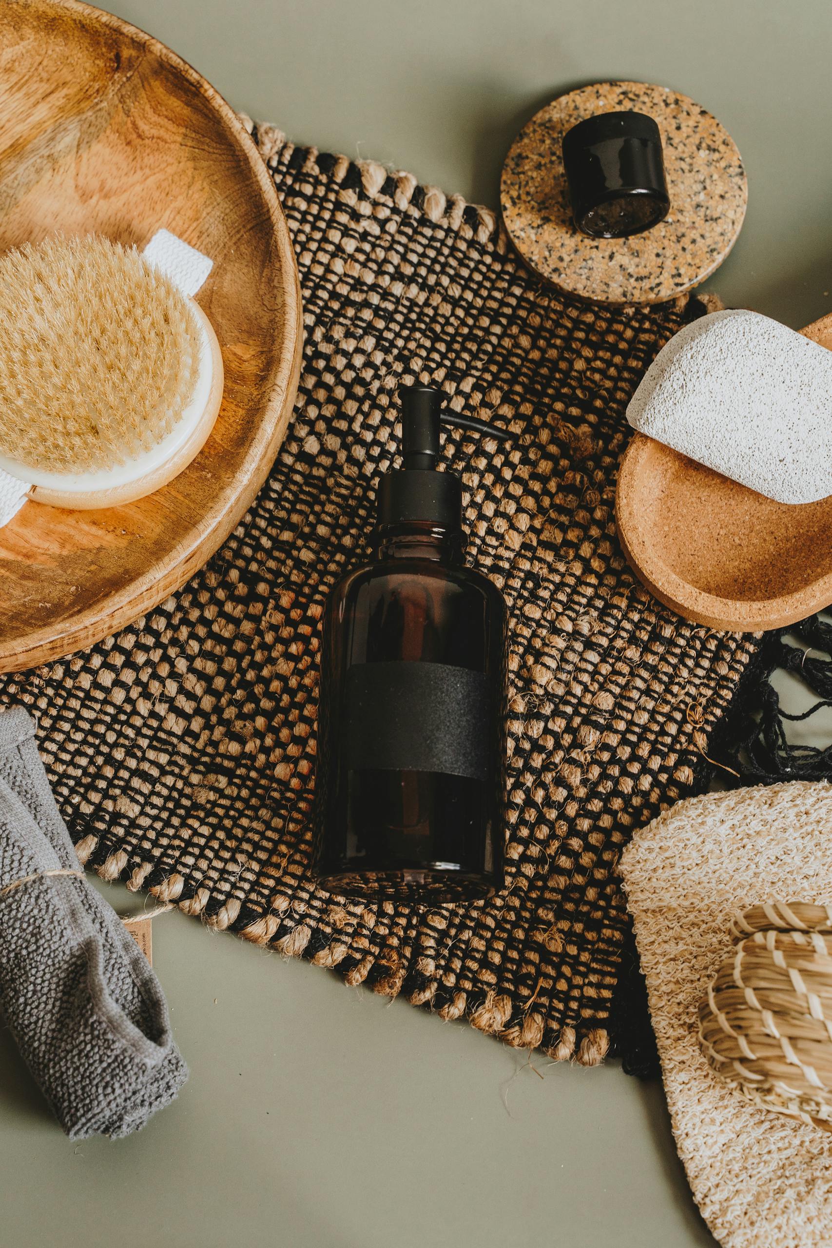 Flay Lay Photo Of Black Bottle
